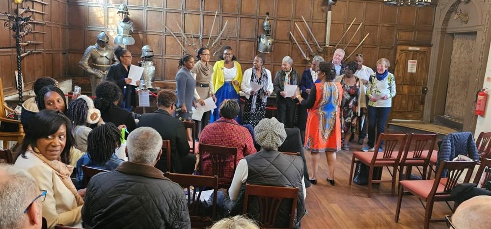 a choir performing in front of a congregation