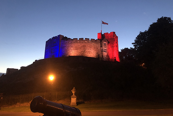Tamworth Castle lit up blue, white and red