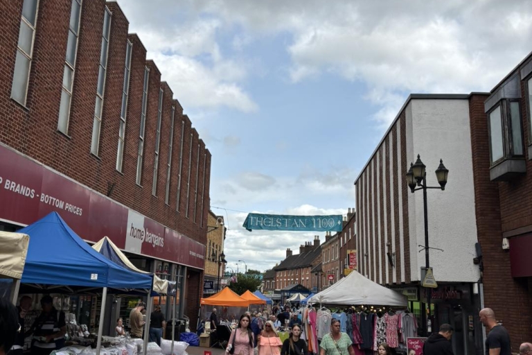 street with market stalls and people
