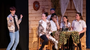 Children on a stage acting